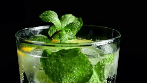 Macro close-up,refreshing soda tonic fizzy water, lime in Glass, ice. Slice of Stock-Footage 148161067