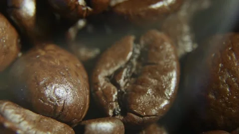 Macro Close Up of Roasted Coffee Beans in Soft Steam. 스톡 동영상 334324777