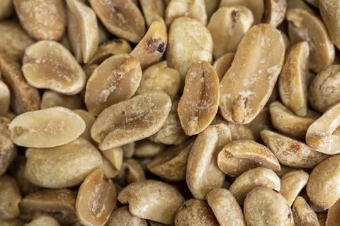 Macro Close Up of Roasted Peanuts Background Stock Photos