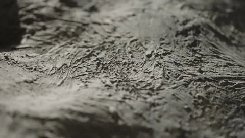 Macro close-up of rough gray plaster surface with heavy trowel marks and ridges Stock Footage 327531053