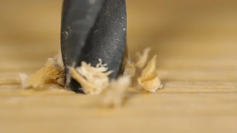 Macro Close up screw driven into a wood plank, Workmans tool turning into wood. 库存影片 93106869