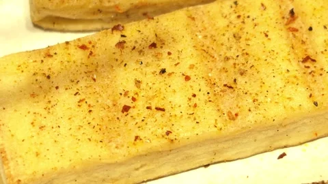 Macro Close-up Sequence of Seasoned Spiced Tofu Block Vidéo 344853337