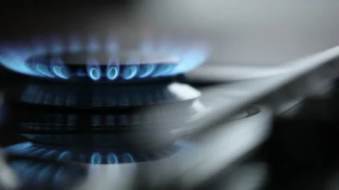 Macro Close-Up of Shifting Focus on Blue Gas Flame from Kitchen Stove Stock Footage 220637935