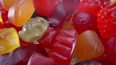 Macro Close-up Shoot of Rotated Multi-colored Jelly Candies Stock Footage 254552276