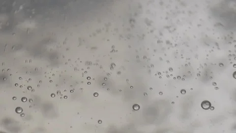 Macro close-up shot of boiling water process. Close-up of steamy water with Stock Footage 126207835