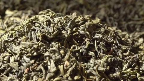 Macro close-up shot: Large-leaf green tea. Stock Footage 121462917