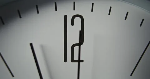 Macro Close Up Shot of Minimalist Wall Clock with Number 12 on Dial, and Running Stock Footage 317808518