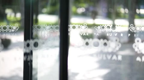 Macro close up shot of  Park Bulvar revolving glass door Stock Footage 60652779