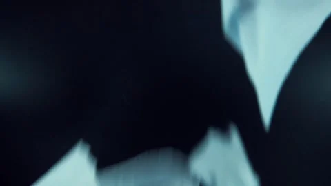 A macro close up shot of a pile of falling papers, white pages, Stock Footage 244856909