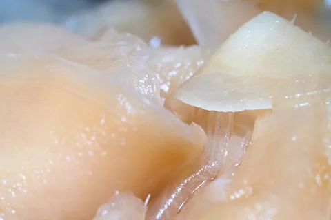 Macro close-up shot of thin slices of pickled ginger root in a pile Stock Photos