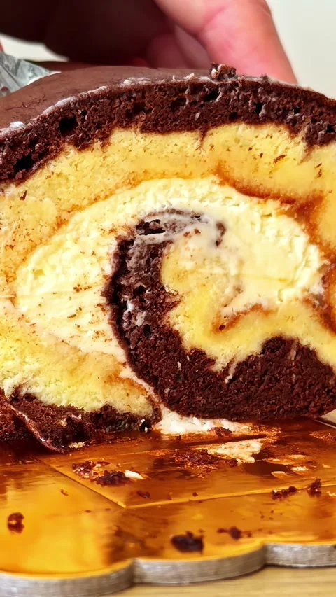 Macro Close Up Of Slicing Delicious Chocolate Swiss Roll Cake Stock Footage 336228780