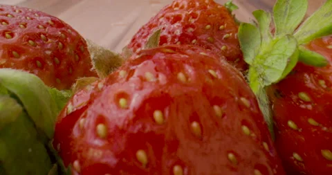 Macro close up slide over fresh, ripe strawberries Stock Footage 138137518