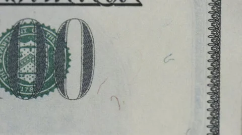 Macro close up slide shot of Ben Franklin's face on the US $100 dollar bill  Stock-Footage 60256943