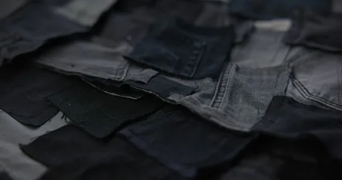 Macro Close Up of Small Denim Fabric Pieces Stock Footage 316164388