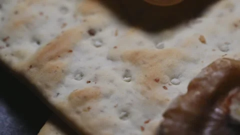 Macro Close Up of a Soda Cracker with Changing Light Stock Footage 344956079