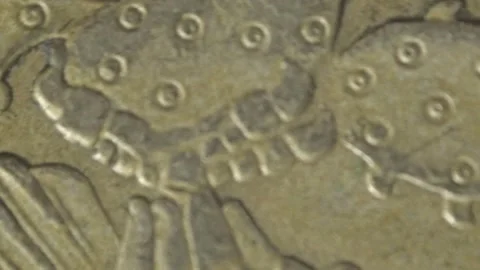 Macro Close Up of Spinning Coin With Eagle Engraving and Metallic Texture Stock Footage 342290002