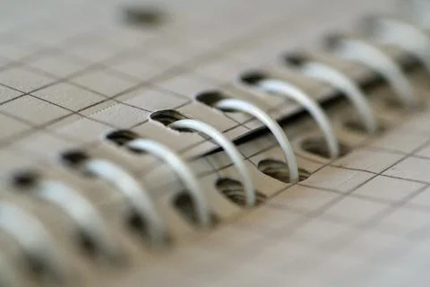 Macro close-up spiral notebook binding rings Stock Photos