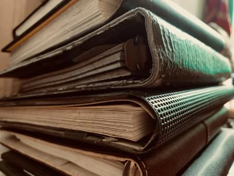 Macro Close Up Stack of Old Vintage Books and Leather Journals Stock Photos