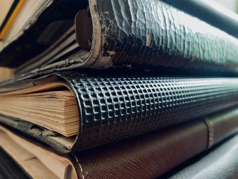 Macro Close Up Stack of Old Vintage Books and Leather Journals Stock Photos