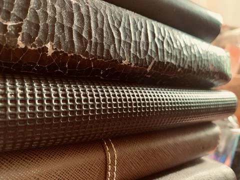 Macro Close Up Stack of Old Vintage Books and Leather Journals Stock Photos