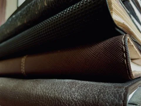 Macro Close Up Stack of Old Vintage Books and Leather Journals Stock Photos