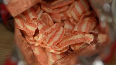 Macro close up of striped potato chips inside snack bag. Stock Footage 331366042