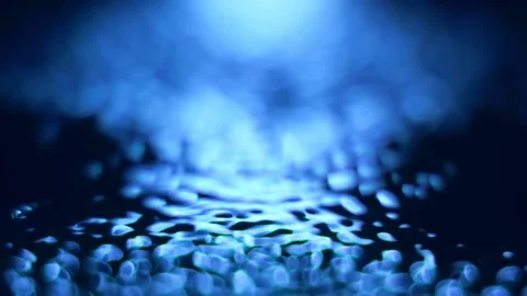 Macro close up super slow motion 1000fps. Vibration liquid in blue color Stock Footage 255197072