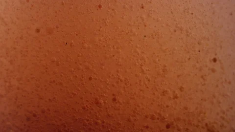 Macro close-up of the surface of the sun liquid texture background Video stock 118302685