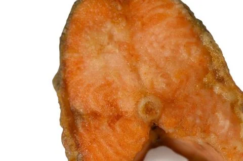 Macro close-up texture of cooked fried salmon steak Stock Photos