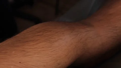 Macro close up of therapist pressing deep into male calf muscle for trigger.. Stock Footage 332125927