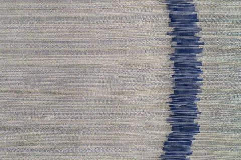 Macro close up of thick stack edge of 100 US dollar banknotes with blue 3D .. Stock Photos