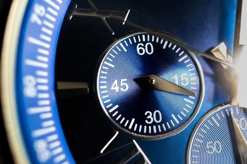 Macro Close Up of Timer Complication on Blue Faced Chronograph Watch Stock Photos