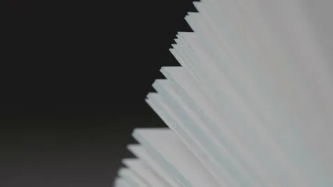 Macro Close-Up of Turning Book Pages Stockbeeldmateriaal 334876783