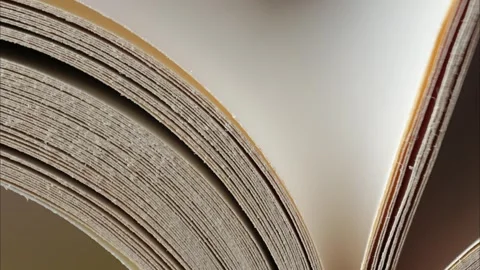 Macro Close Up of Turning Paper Pages Stock Footage 334078669