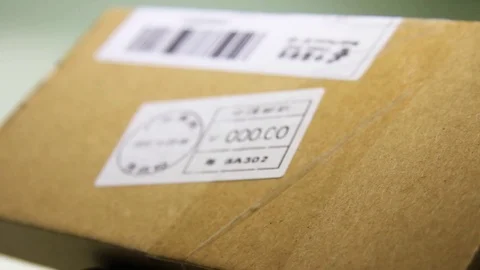 Macro Close Up Of Two Parcel Packages. Stock Footage 97868052