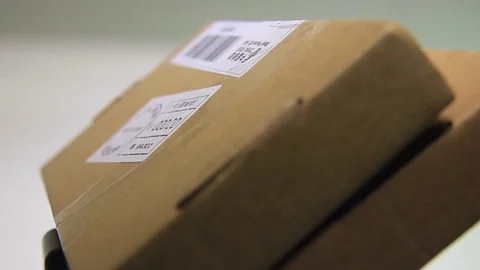 Macro Close Up Of Two Parcel Packages. Stock Footage 97868058