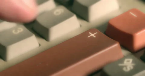Macro Close ups of hand pushing numeric buttons on vintage Adding Machine Stock Footage 235394088