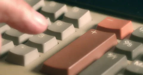 Macro Close ups of hand pushing numeric buttons on vintage Adding Machine Stock Footage 235395274