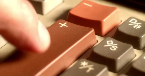 Macro Close ups of hand pushing numeric buttons on vintage Adding Machine Stock Footage 235395922