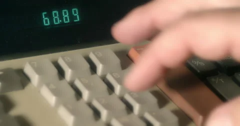 Macro Close ups of hand pushing numeric buttons on vintage Adding Machine Stock Footage 235397912