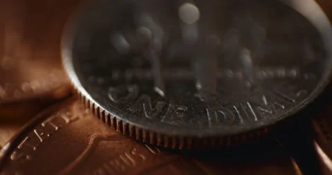 Macro close up of US dime coin with shining light Stock Footage 139663932