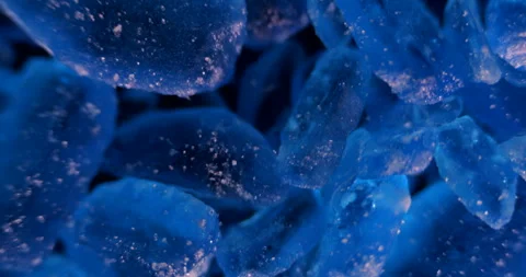 Macro close-up of vibrant blue copper sulfate crystals Video stock 308433116