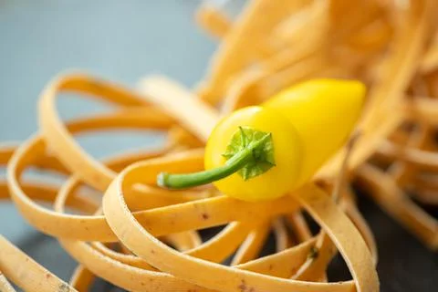 Macro close-up of a vibrant yellow pepper resting. Stock-Fotos