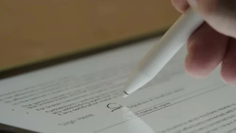 Macro Close up view of Electronic Signature on Tablet Computer by Stylus in Hand Stock Footage 152105275