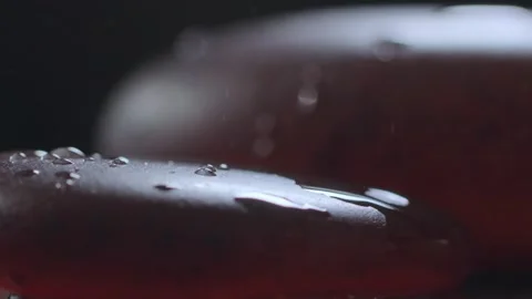 Macro close-up of water droplets on an agate stone Stock Footage 345565777