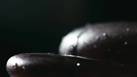 Macro close-up of water droplets on an agate stone. Stock Footage 345566516