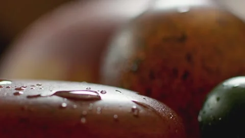 Macro close-up of water droplets on an agate stone. Stock Footage 345566518