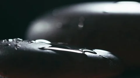 Macro close-up of water droplets on an agate stone. Stock Footage 345566621