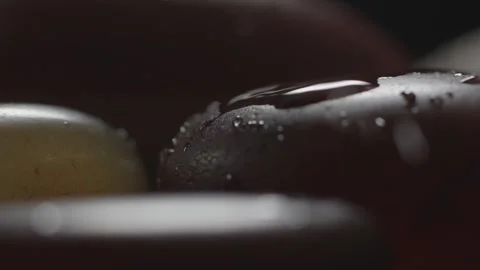 Macro close-up of water droplets on an agate stone. Stock Footage 345567038