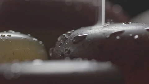 Macro close-up of water droplets on an agate stone. Stock Footage 345567870